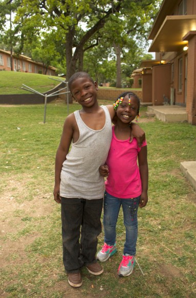 Termaine Sparkman and his sister Marleya Silas pose for a picture on May 5, 2015 in Rosewood Courts in Austin, Texas.